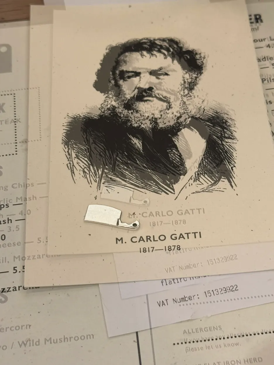 菜单上的百年创始人 Carlo Gatti 画像与小斧子代币