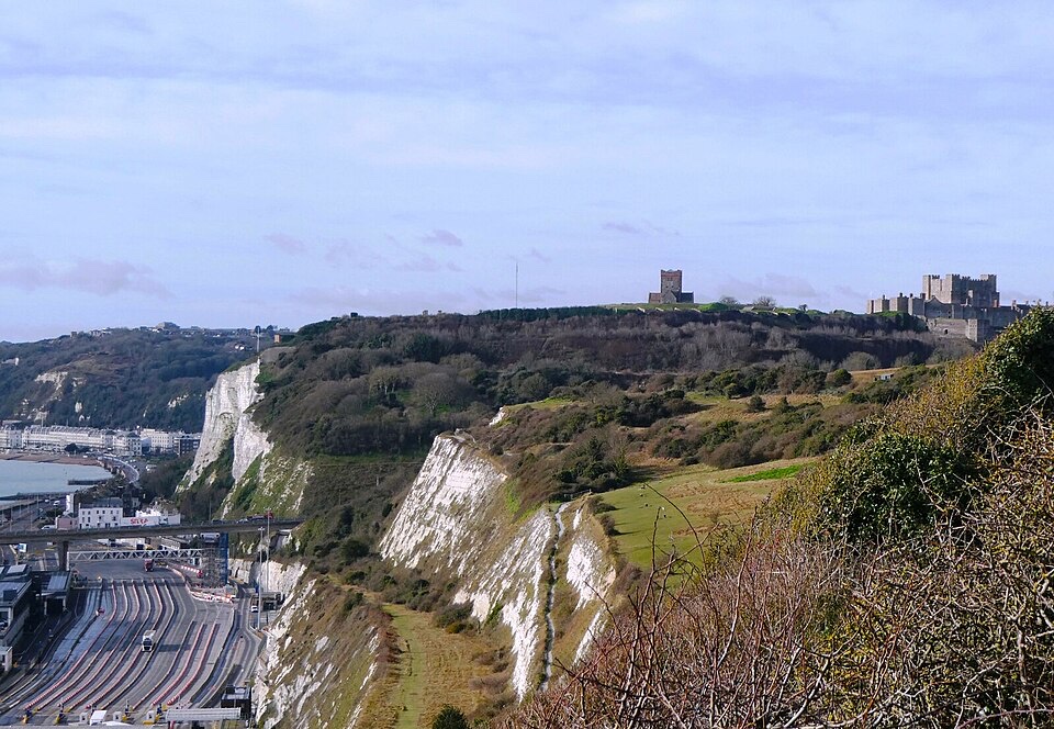 Dover's white cliffs, harbour and Dover Castle in the distance